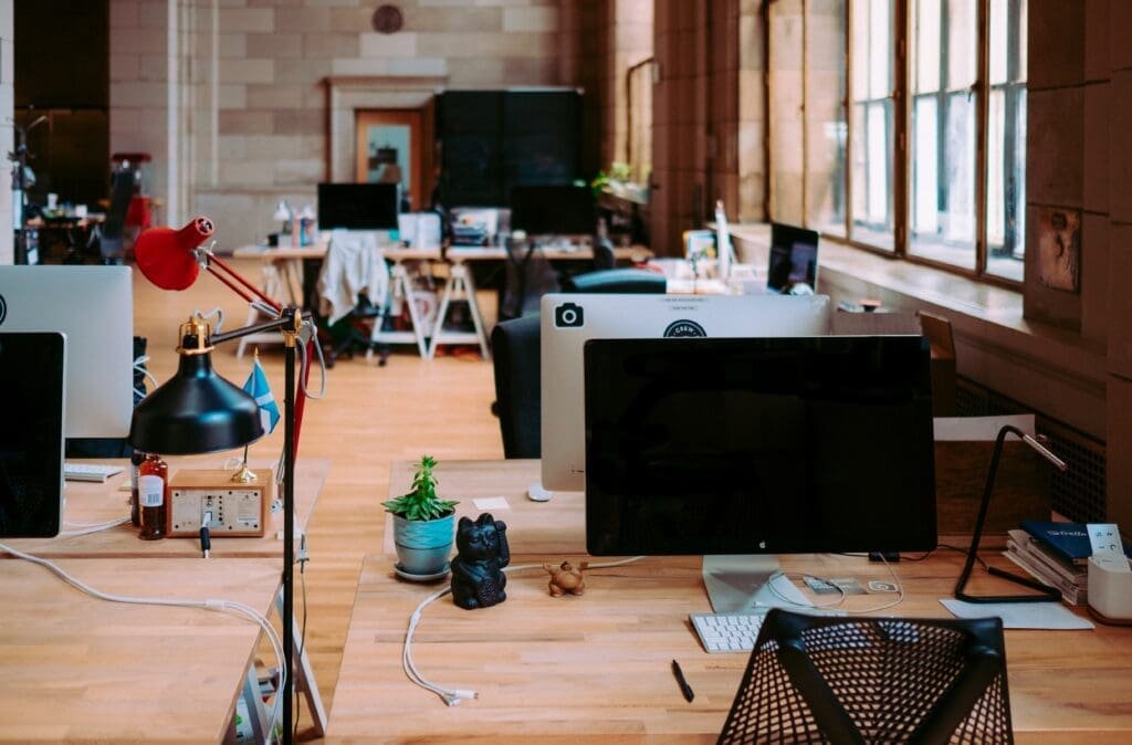 Modern office space featuring desks with computers