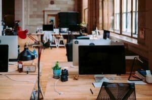 Modern office space featuring desks with computers