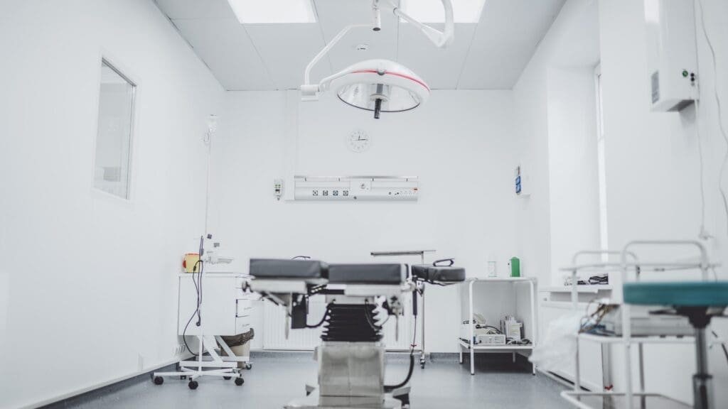 Surgical room featuring an examination table