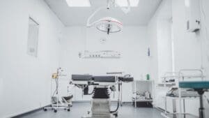 Surgical room featuring an examination table