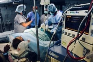 Medical team attending to a patient in an operating room
