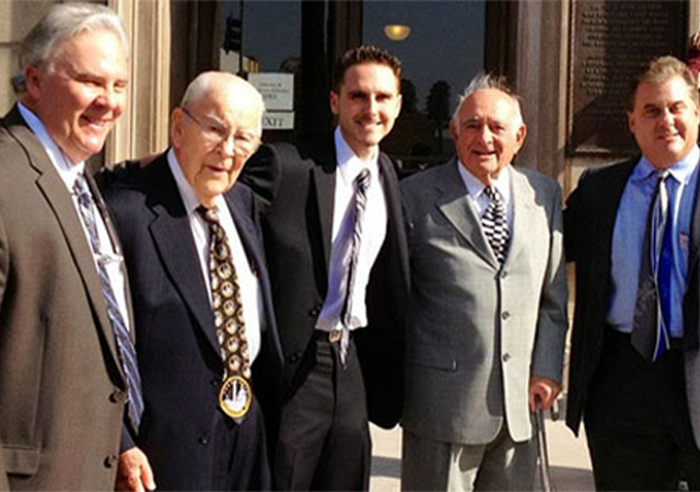 SANFORD A. KASSEL, A Professional Law Corporation | 3 Generations of Lawyers on courthouse steps celebrating Gavin Kassel being sworn in as the newest attorney in the family