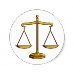 Golden scales of justice symbolizing fairness and equity, often used in legal contexts to represent law and order.